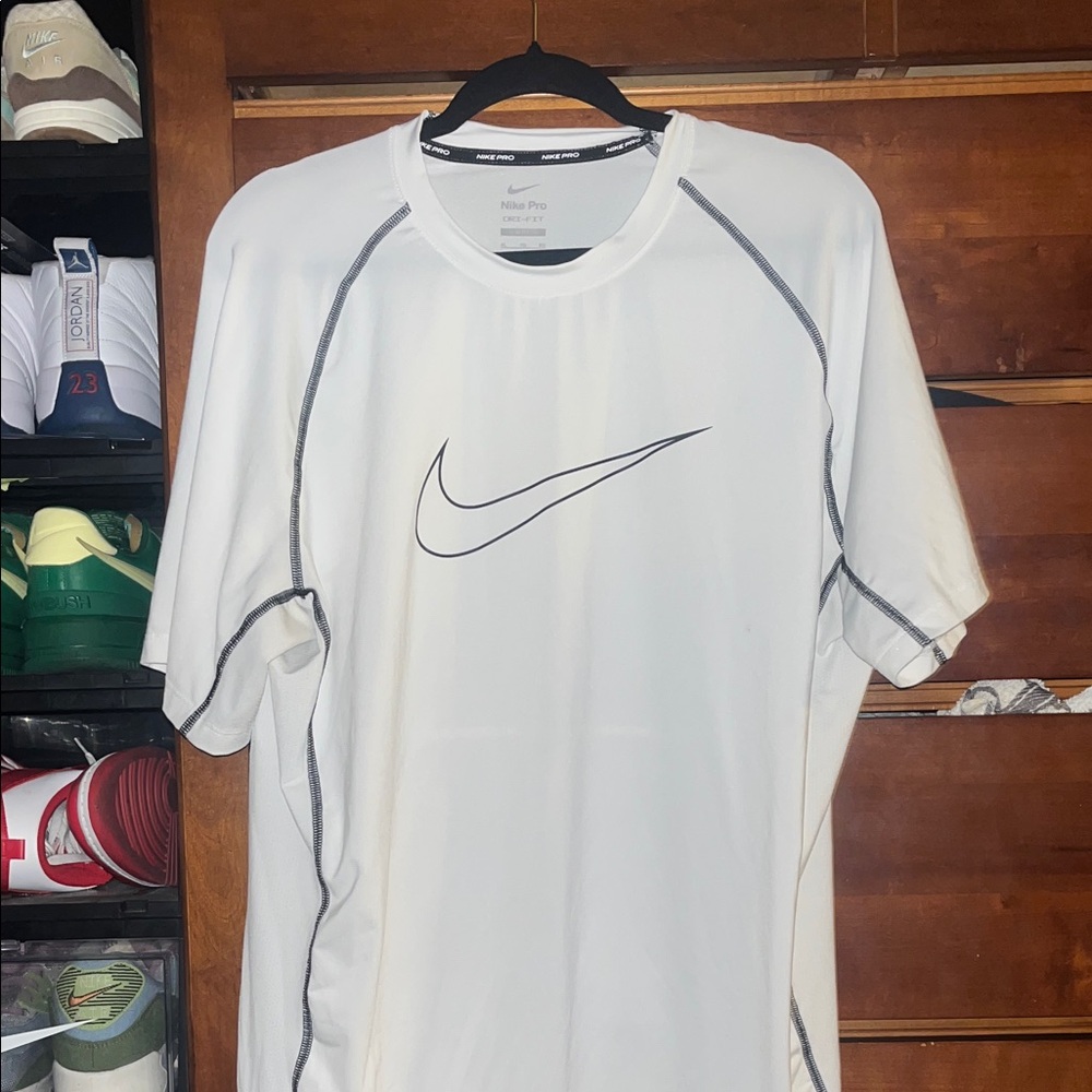 Nike White Short-Sleeve Dri-FIT Athletic Tee with Black Swoosh